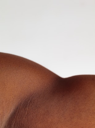 a close up of a person's back with no shirt on