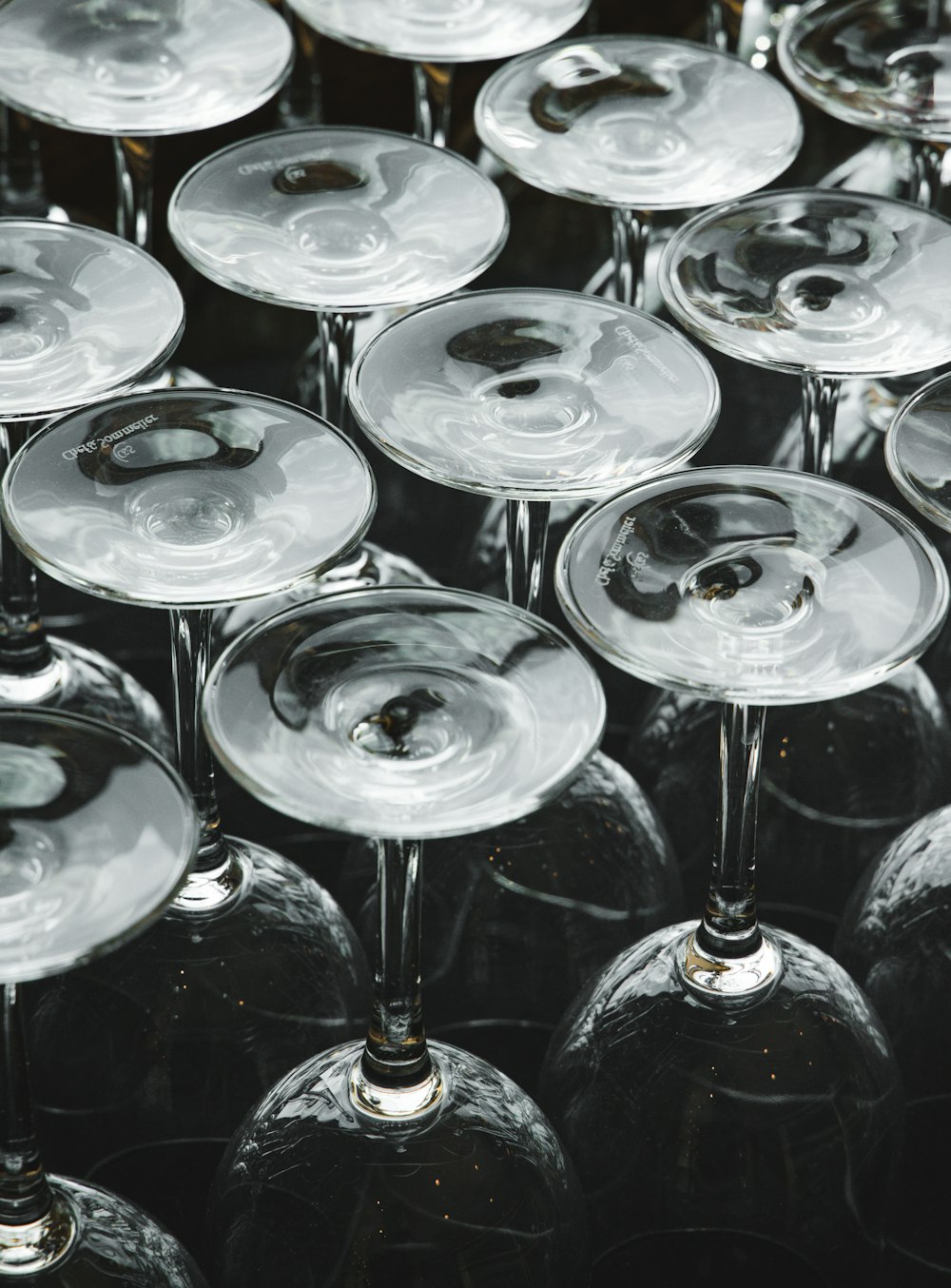 a group of wine glasses sitting on top of each other