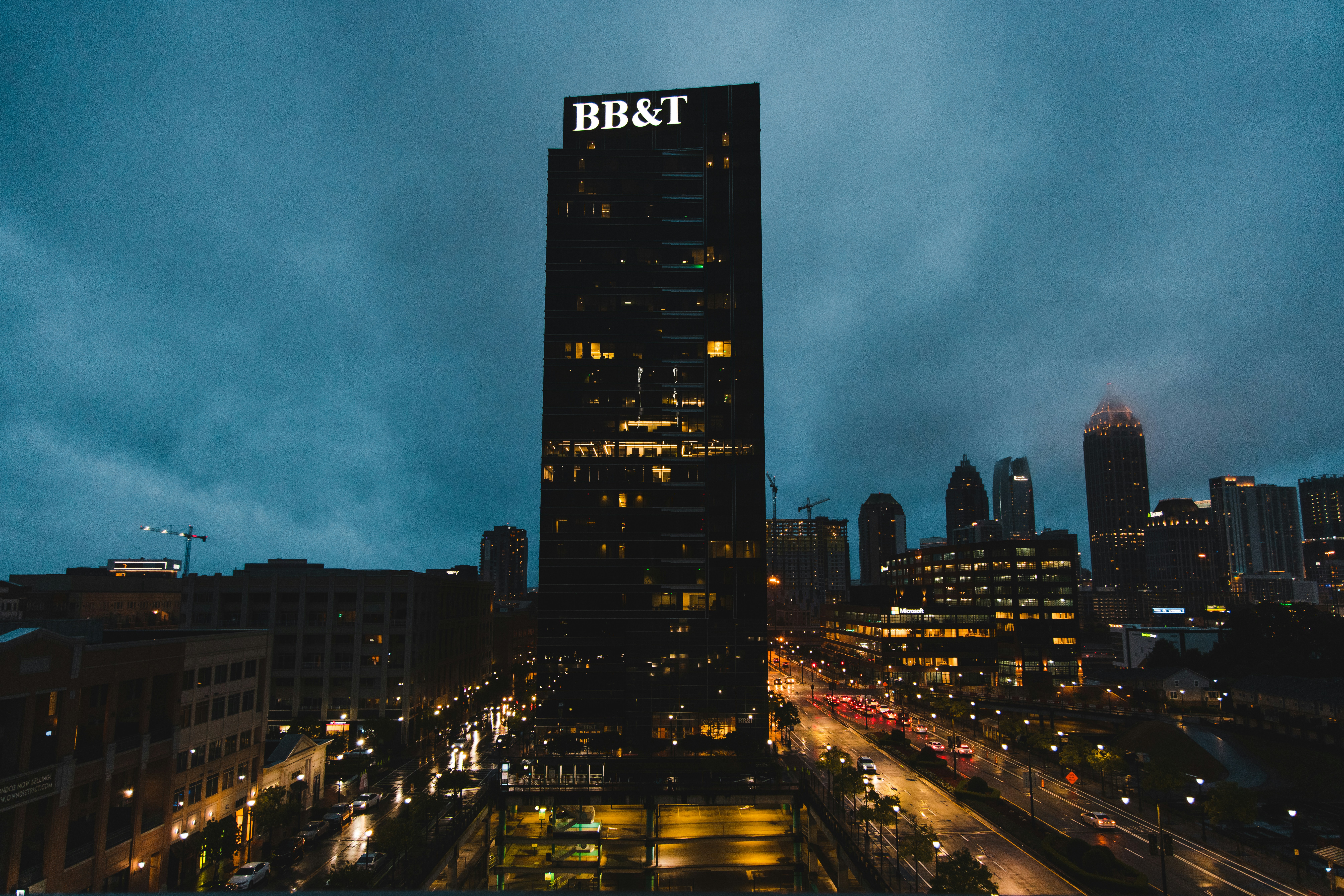 a tall building with a sign on top of it