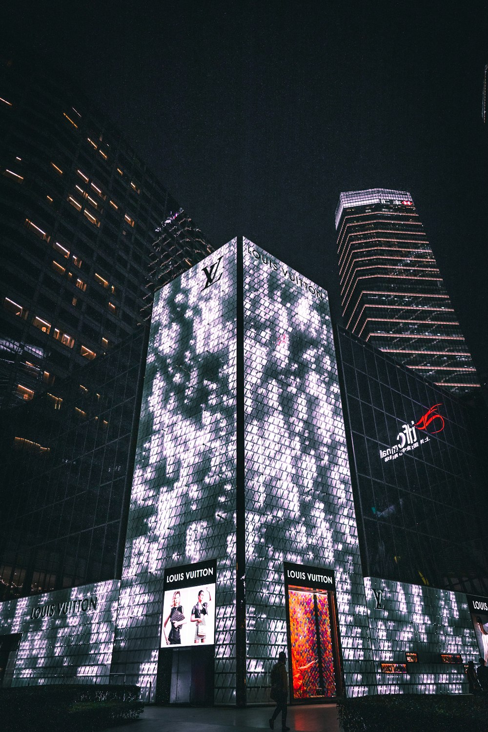 a tall building with a lot of lights on it