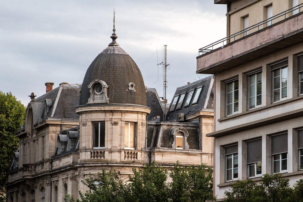 a building with a dome and a clock on the top