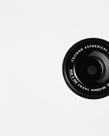 a close up of a camera lens on a white background