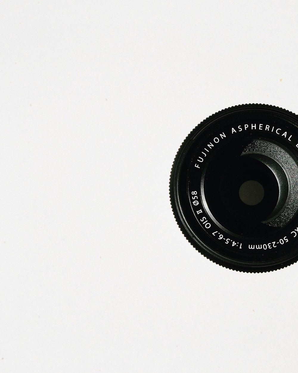 a close up of a camera lens on a white background