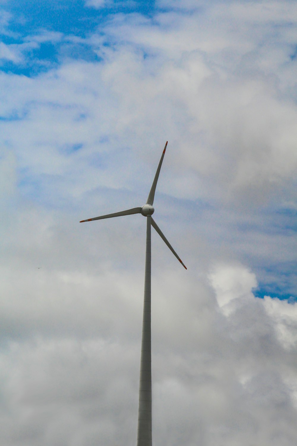 a wind turbine on a cloudy day