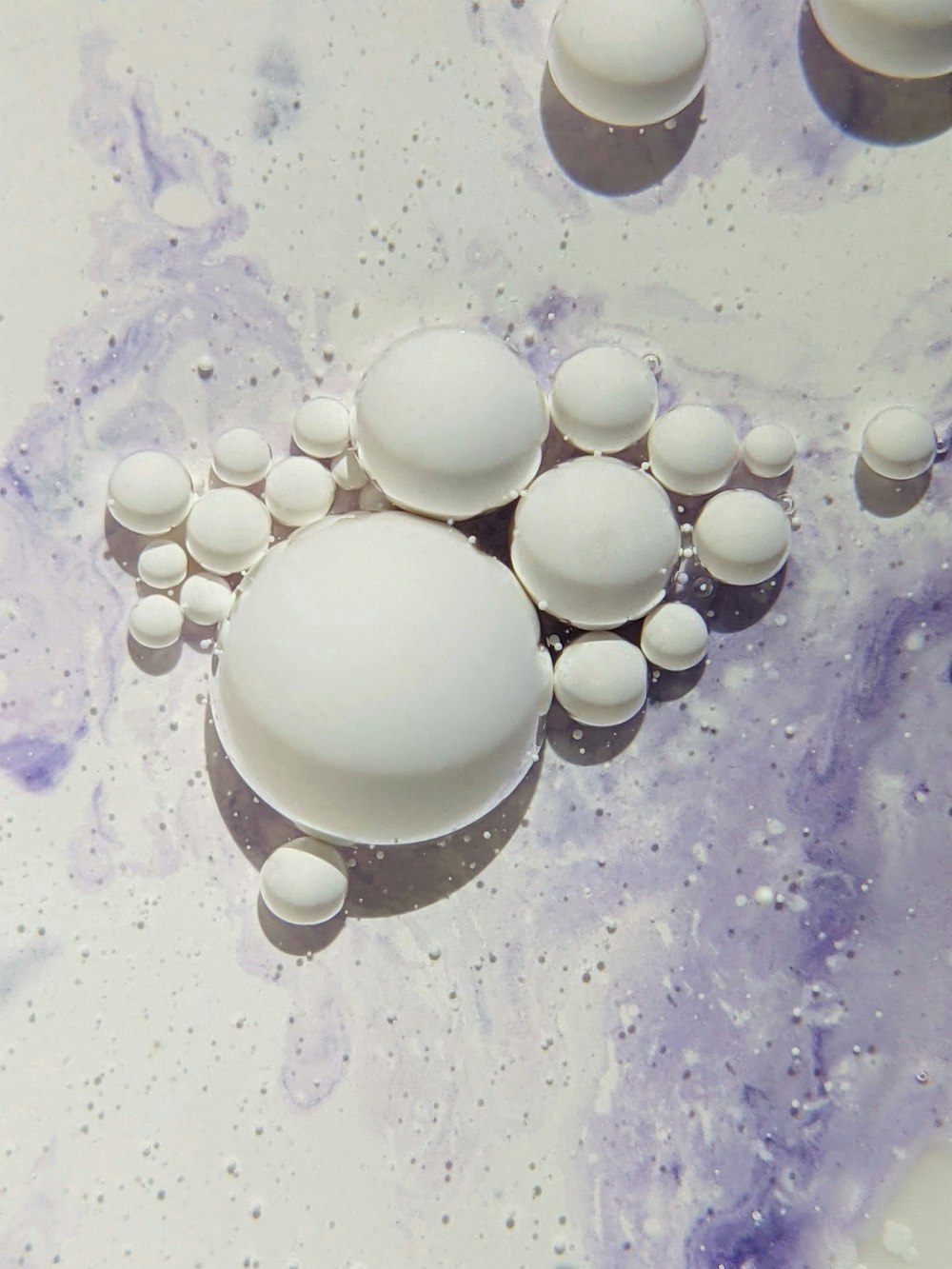 a group of white objects floating on top of a table