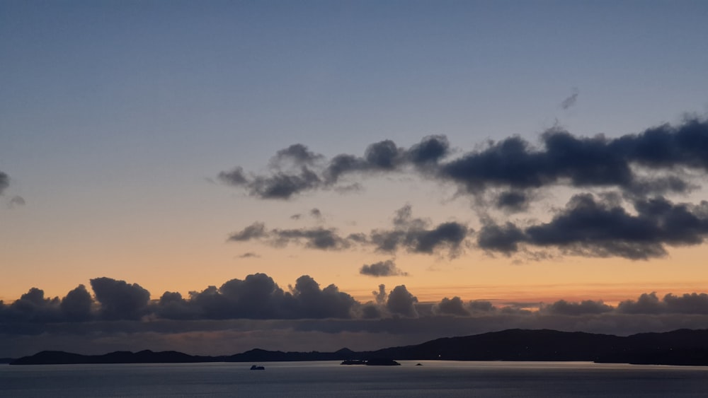 a plane flying over a large body of water