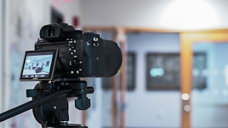 a camera on a tripod in a room