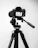 Snapgo360 tripod mount attached to a camera, set against a clean, bright background.