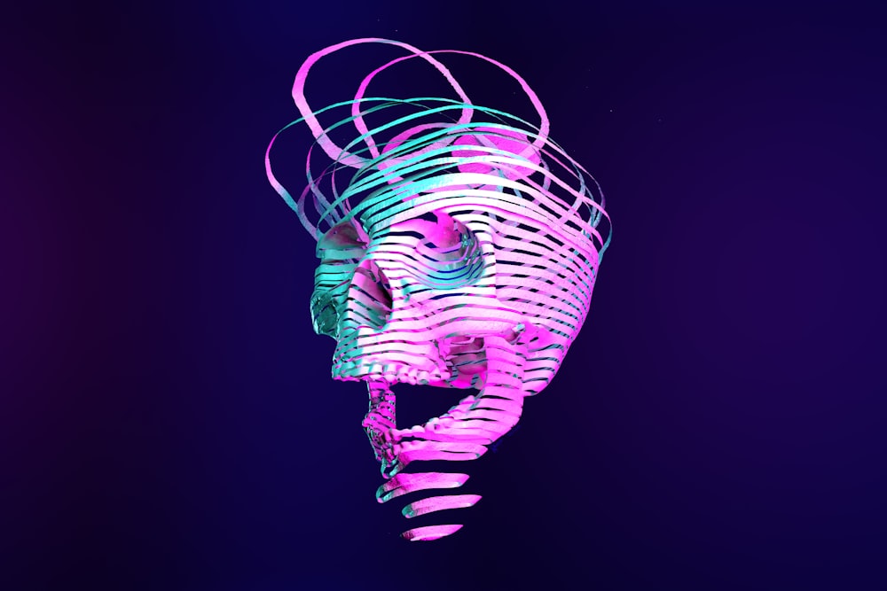 a neon skull is shown against a dark background