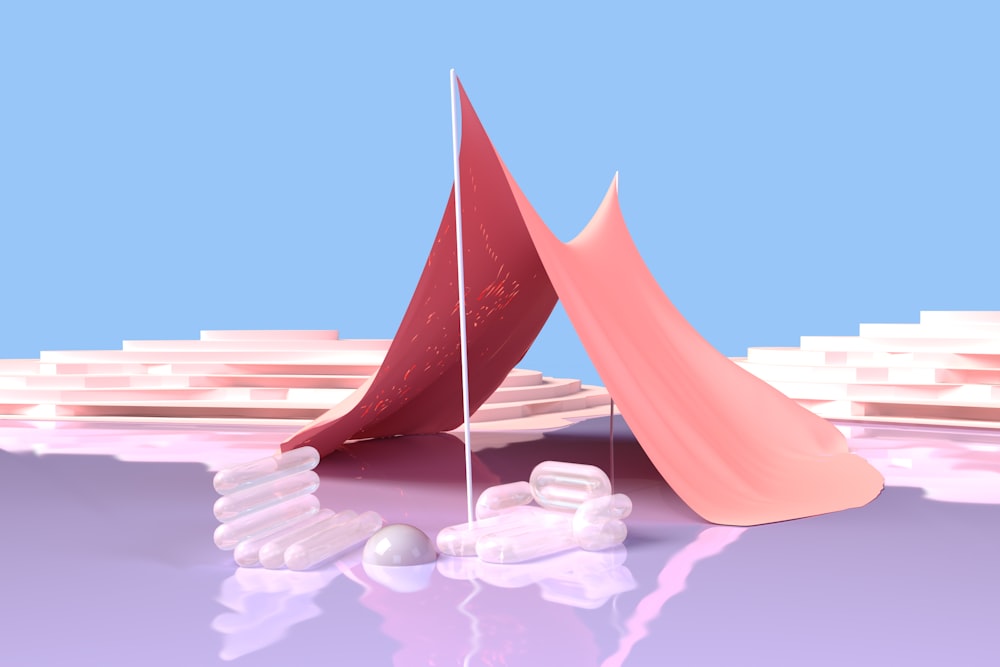 a pink tent sitting on top of a purple surface