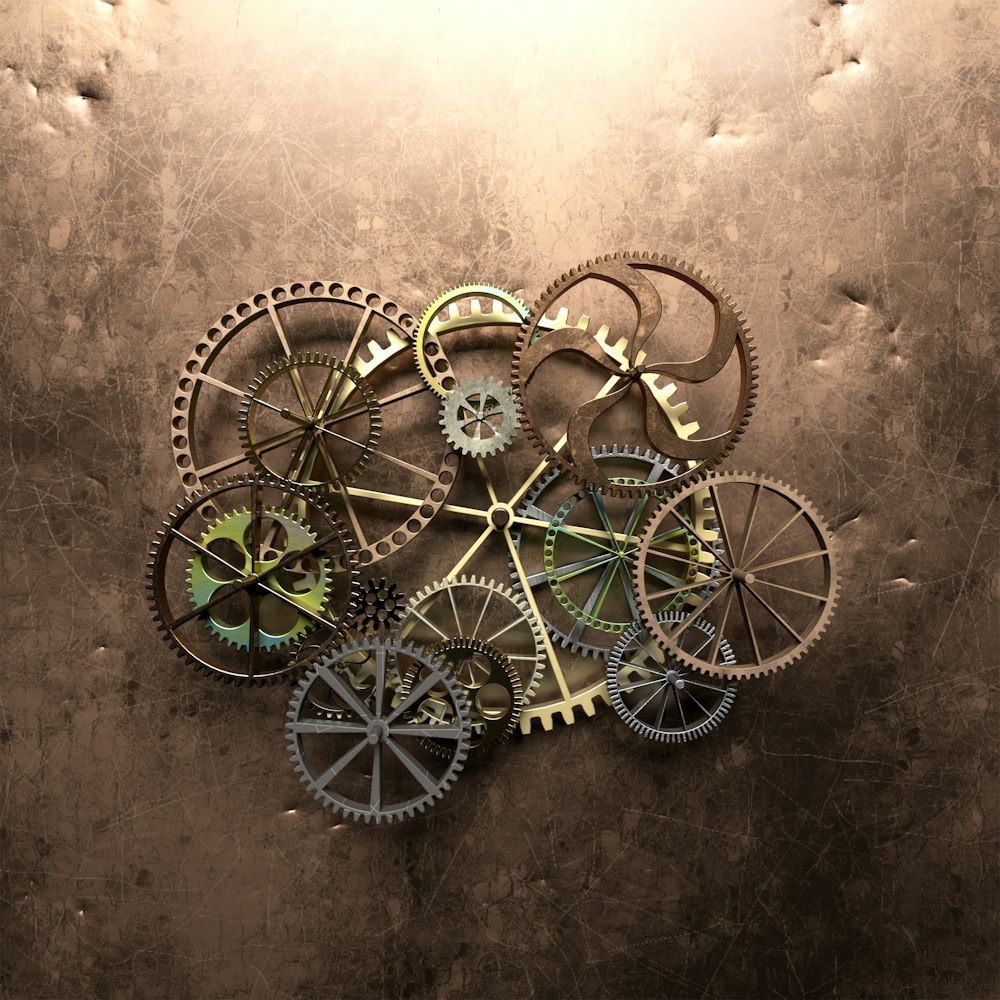 a group of gears sitting on top of a metal surface