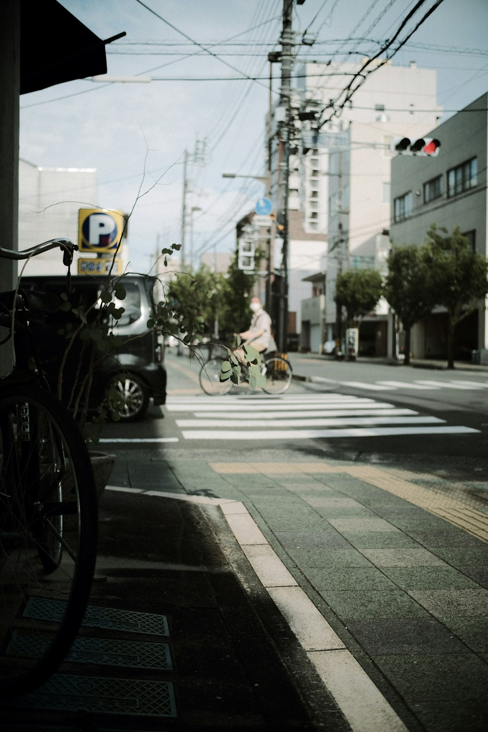 a bicycle parked on the side of a street