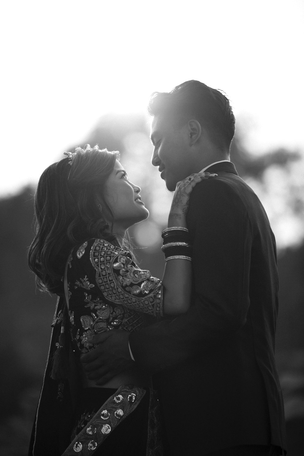 Before: candid unedited silhouette capture of the same couple
