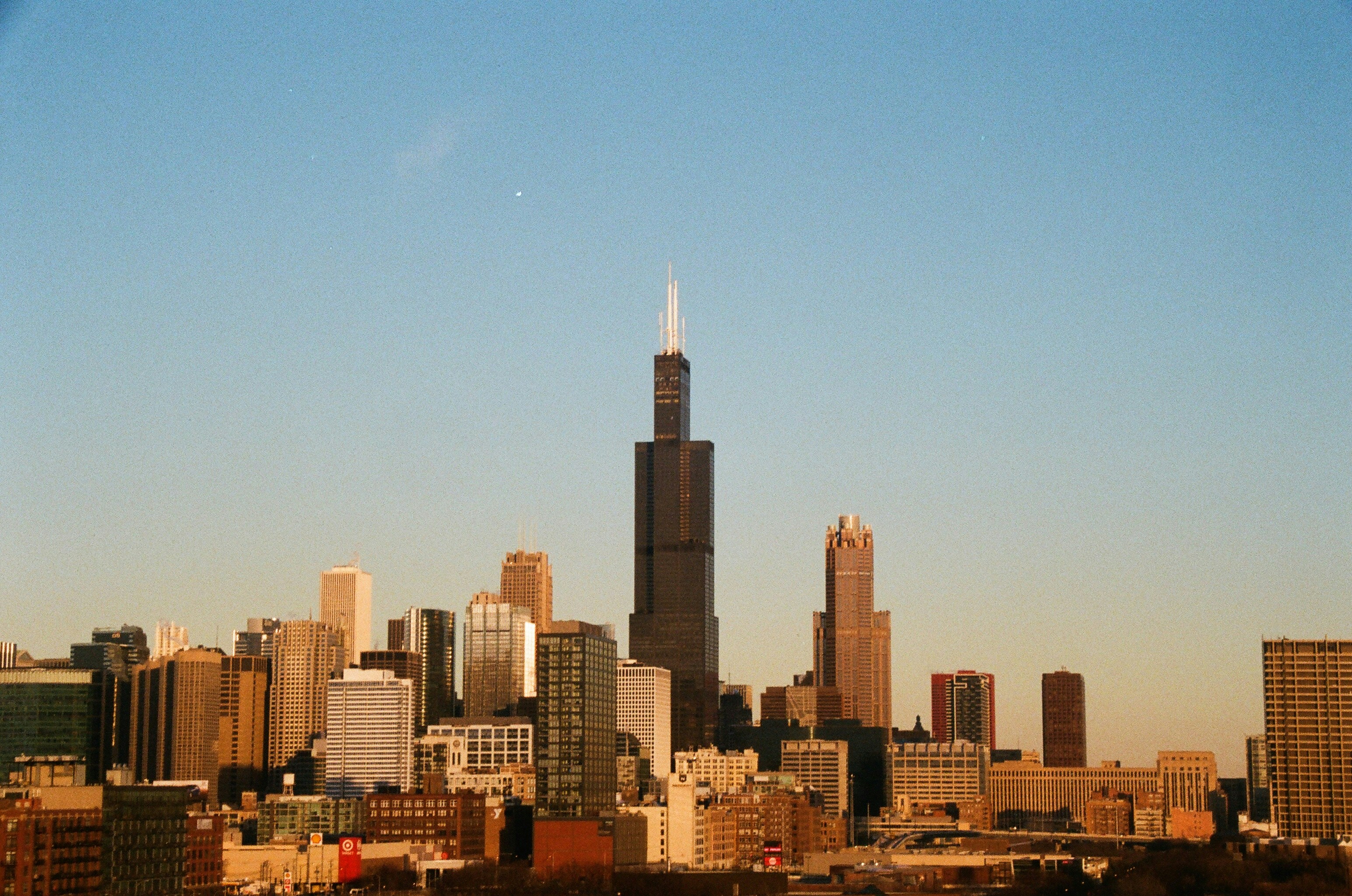 a view of a city with tall buildings