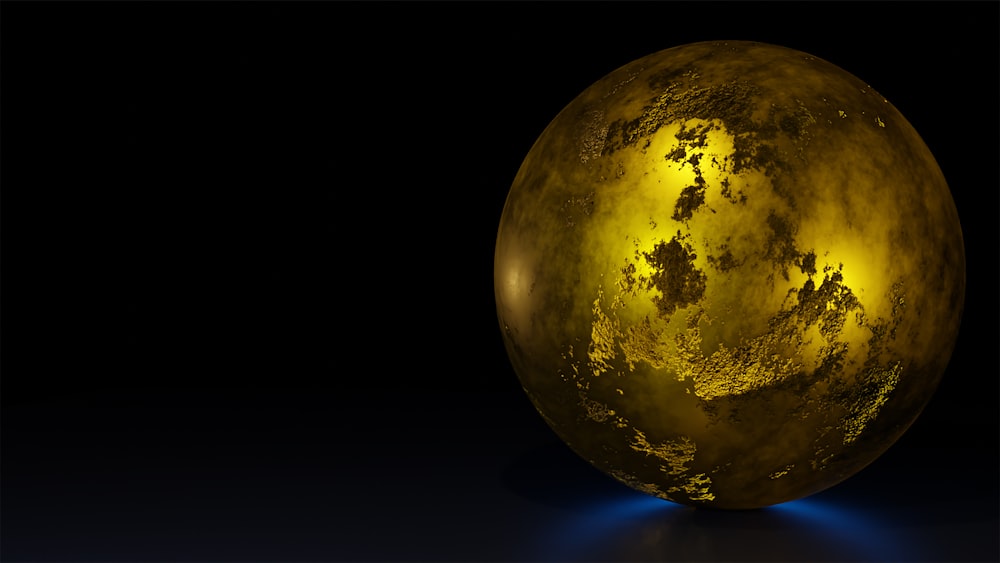 a golden sphere with a black background