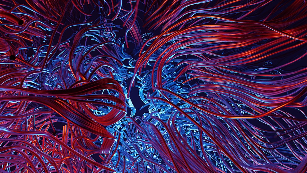 Una pintura abstracta de líneas rojas y azules