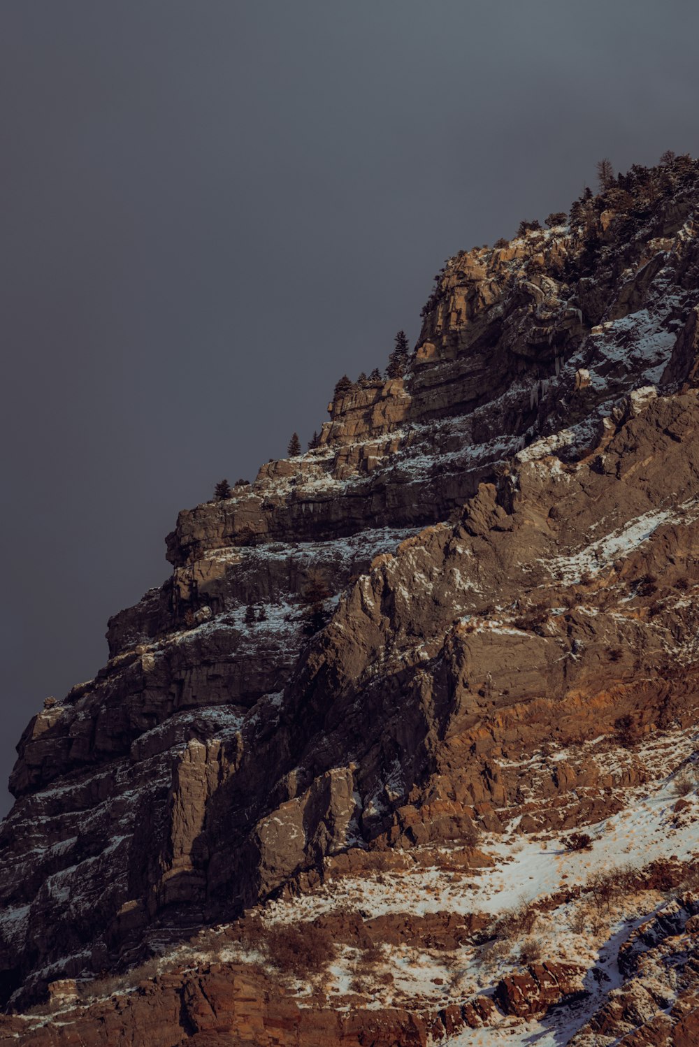 a very tall mountain with a snow covered top