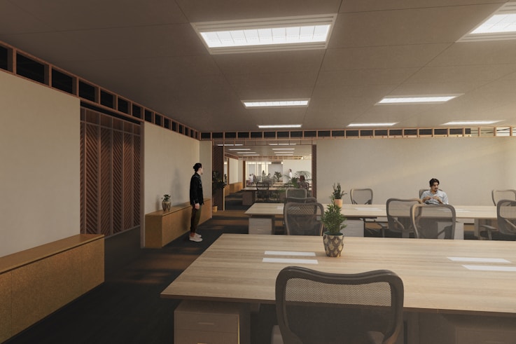 A minimalist, modern newsroom with clean lines, bright screens, and journalists collaborating around a central table.