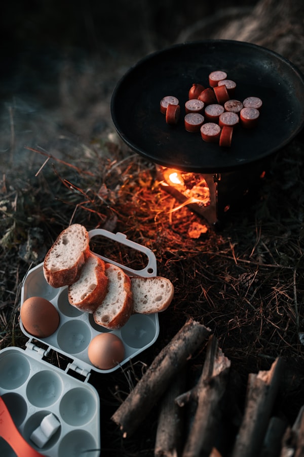 Beef sausages sizzling on a barbecue grill at a Sausage Party fundraiser