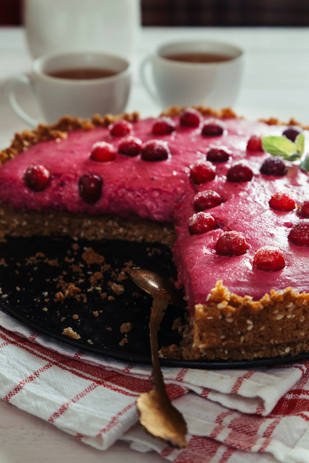 a close up of a pie on a plate on a table