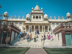 a group of people walking up and down a set of stairs