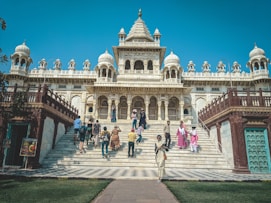 a group of people walking up and down a set of stairs