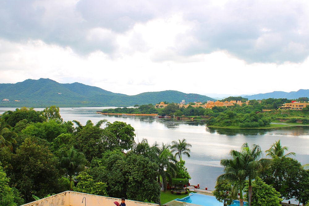 a view of a body of water with mountains in the background