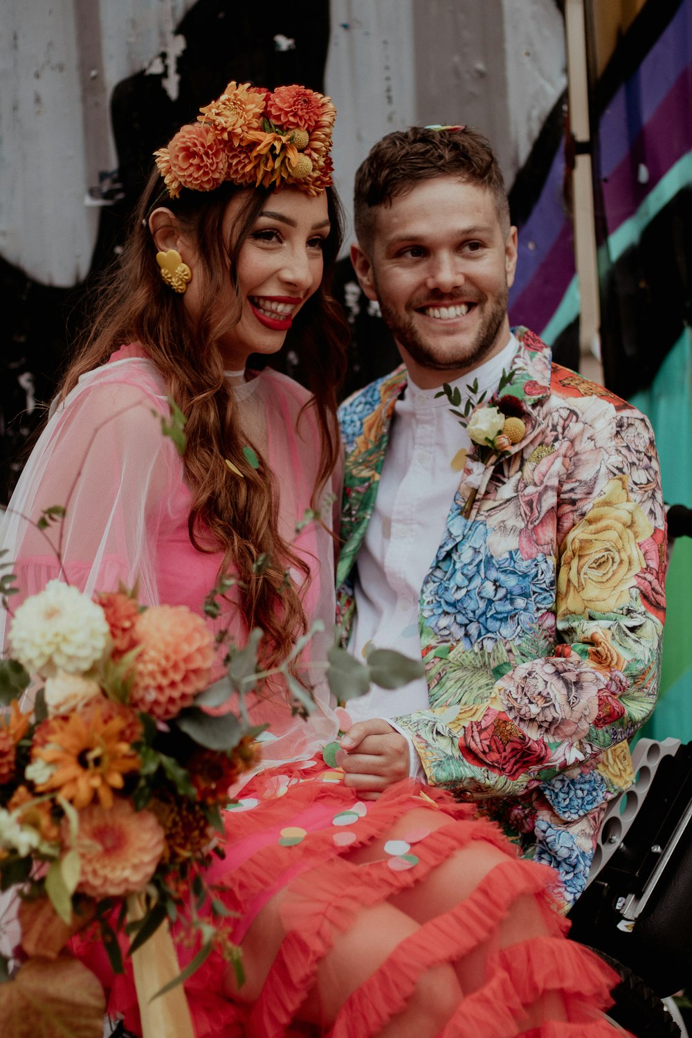 a man and a woman sitting next to each other