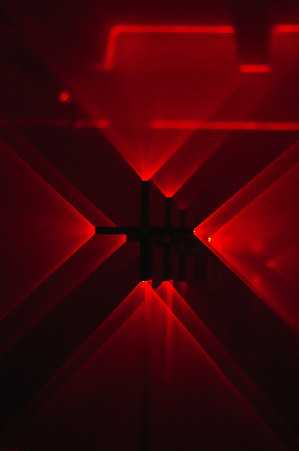 a close up of a red light in a room