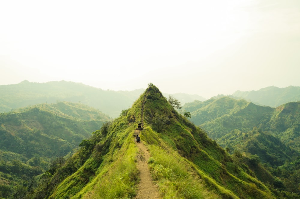 a mountain with a trail going up the side of it