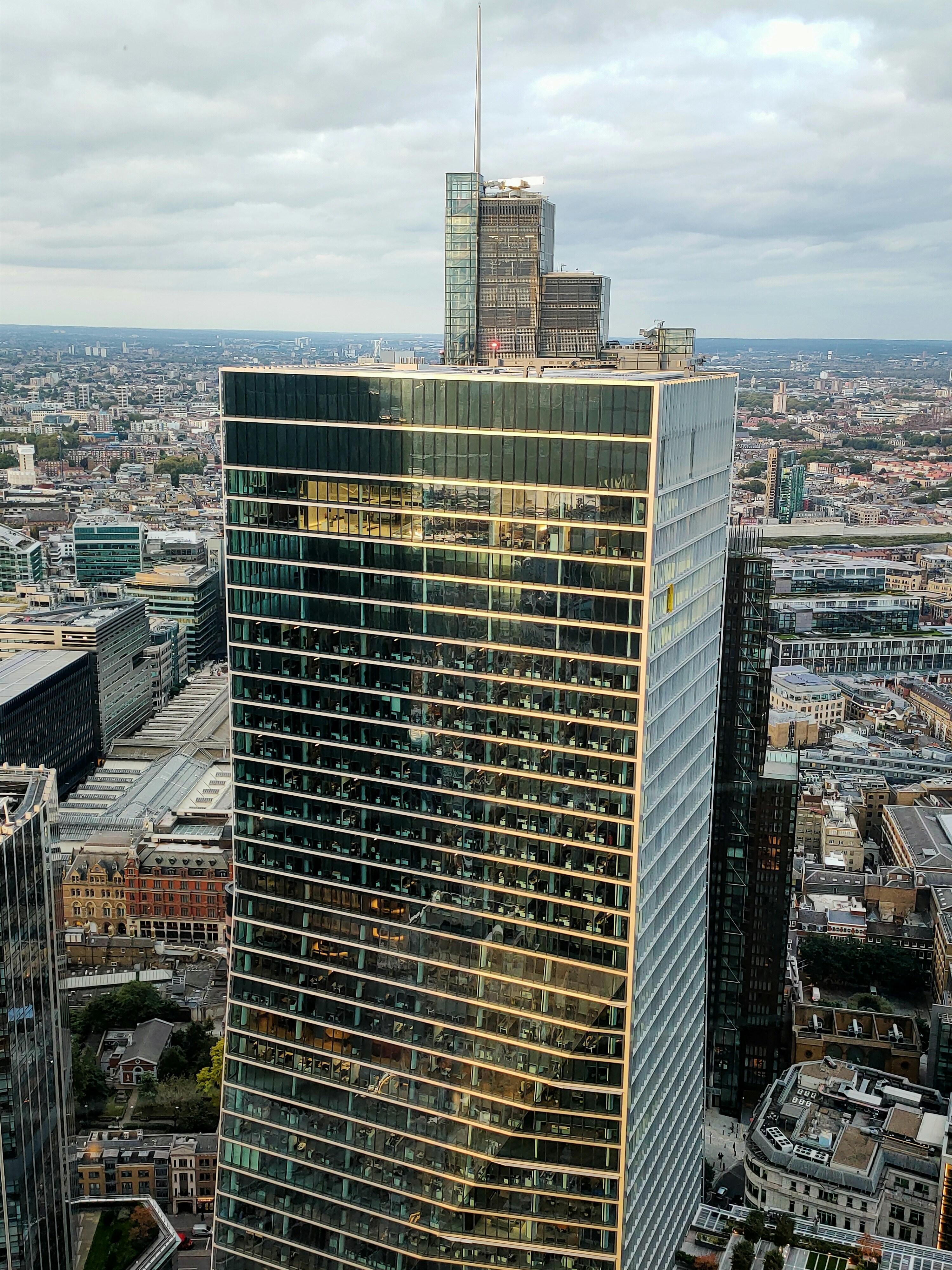 a very tall building in the middle of a city