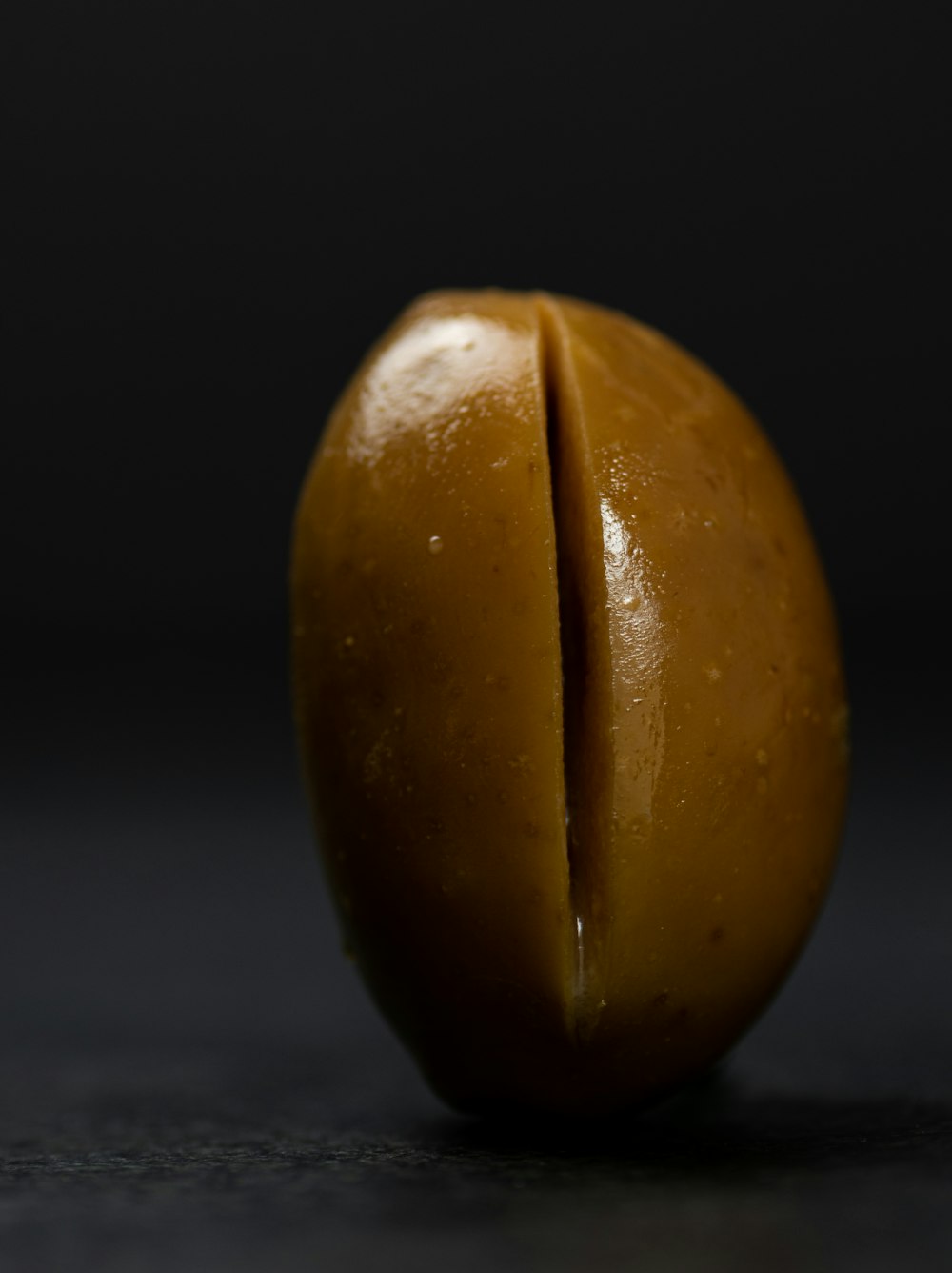 a close up of a piece of fruit on a table