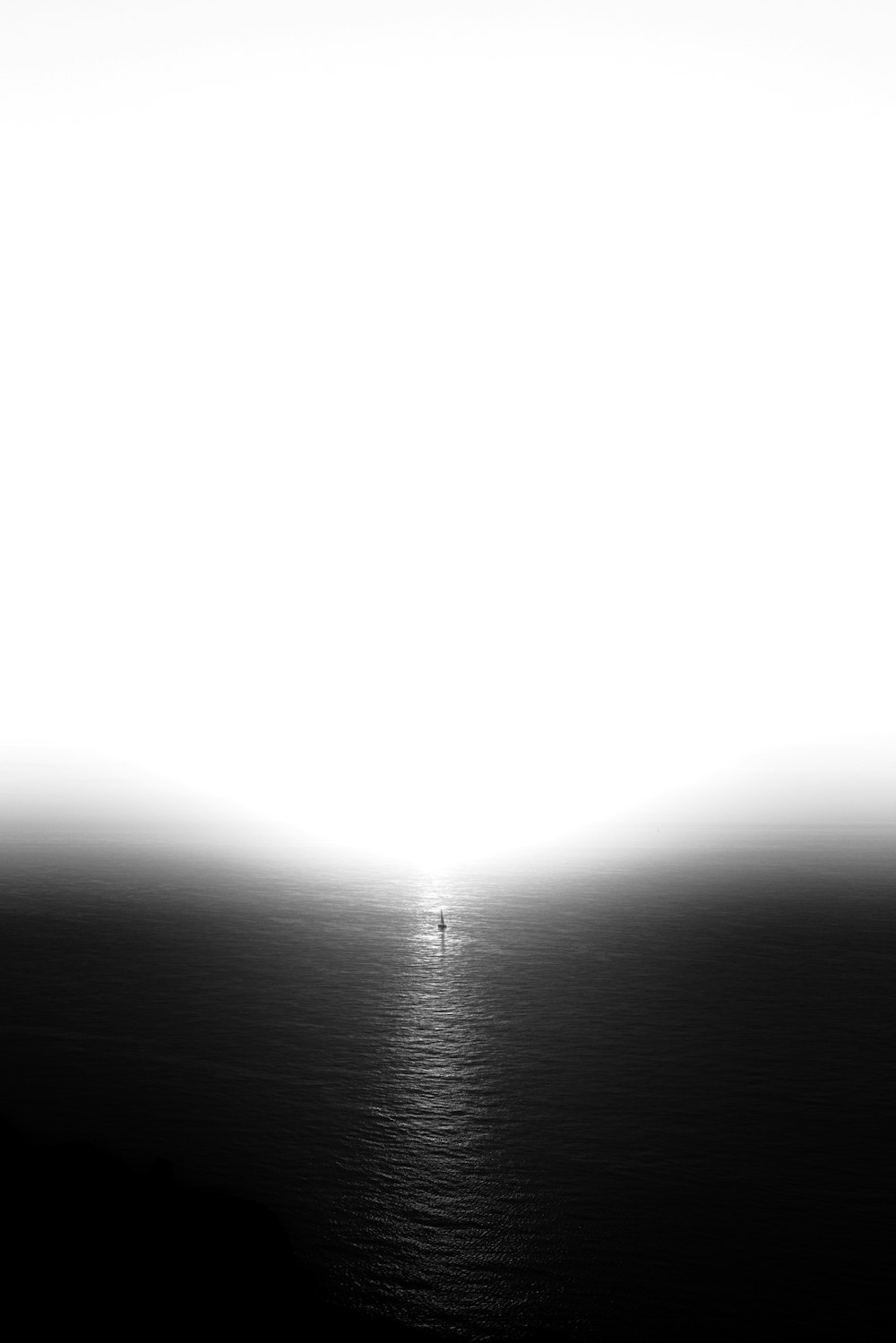 a black and white photo of the ocean