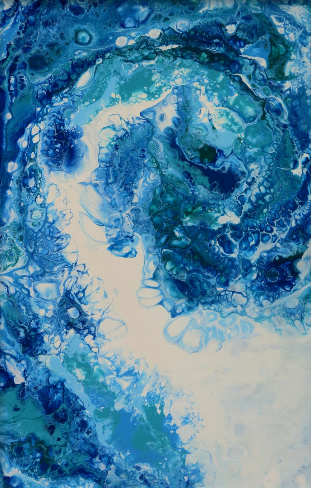 a painting of blue and white swirls on a white background