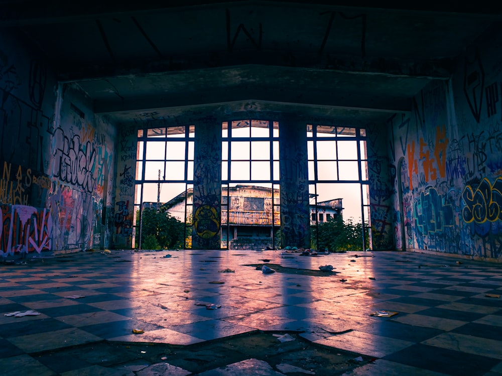 a room that has some graffiti on the walls