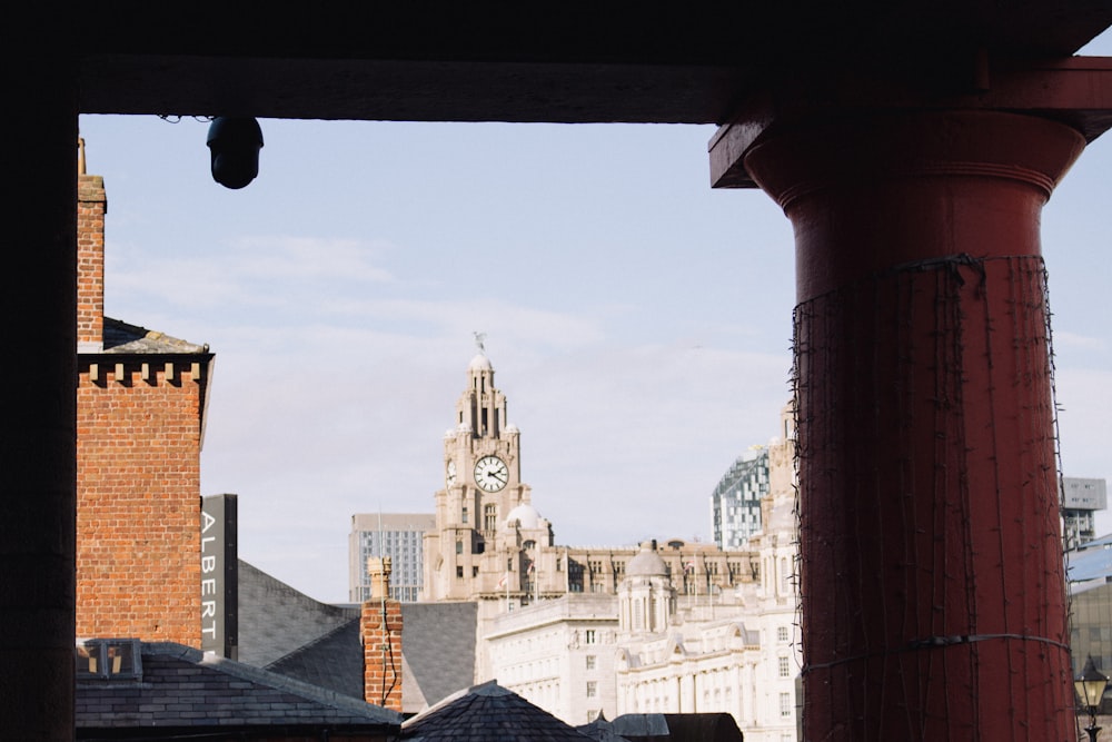 a clock tower towering over a city skyline