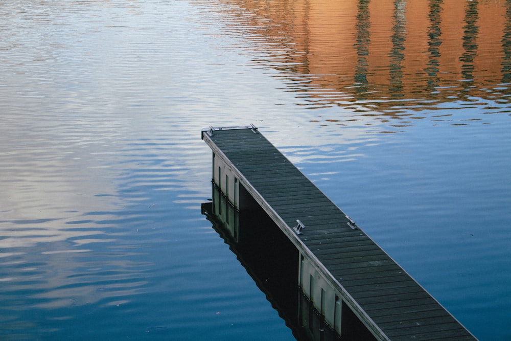 a dock in the middle of a body of water