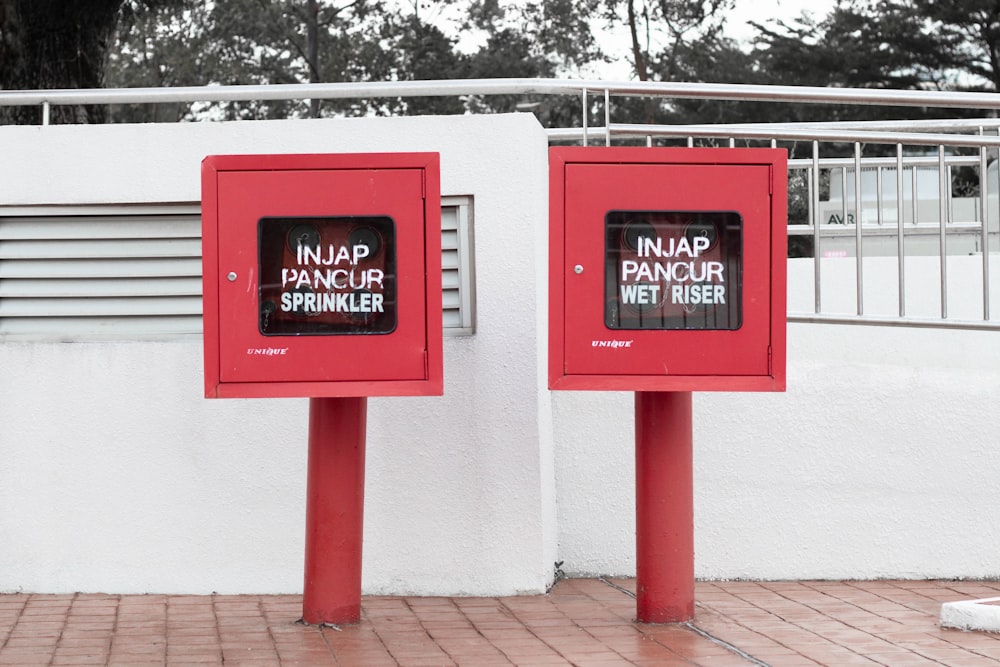 a couple of red boxes sitting next to each other