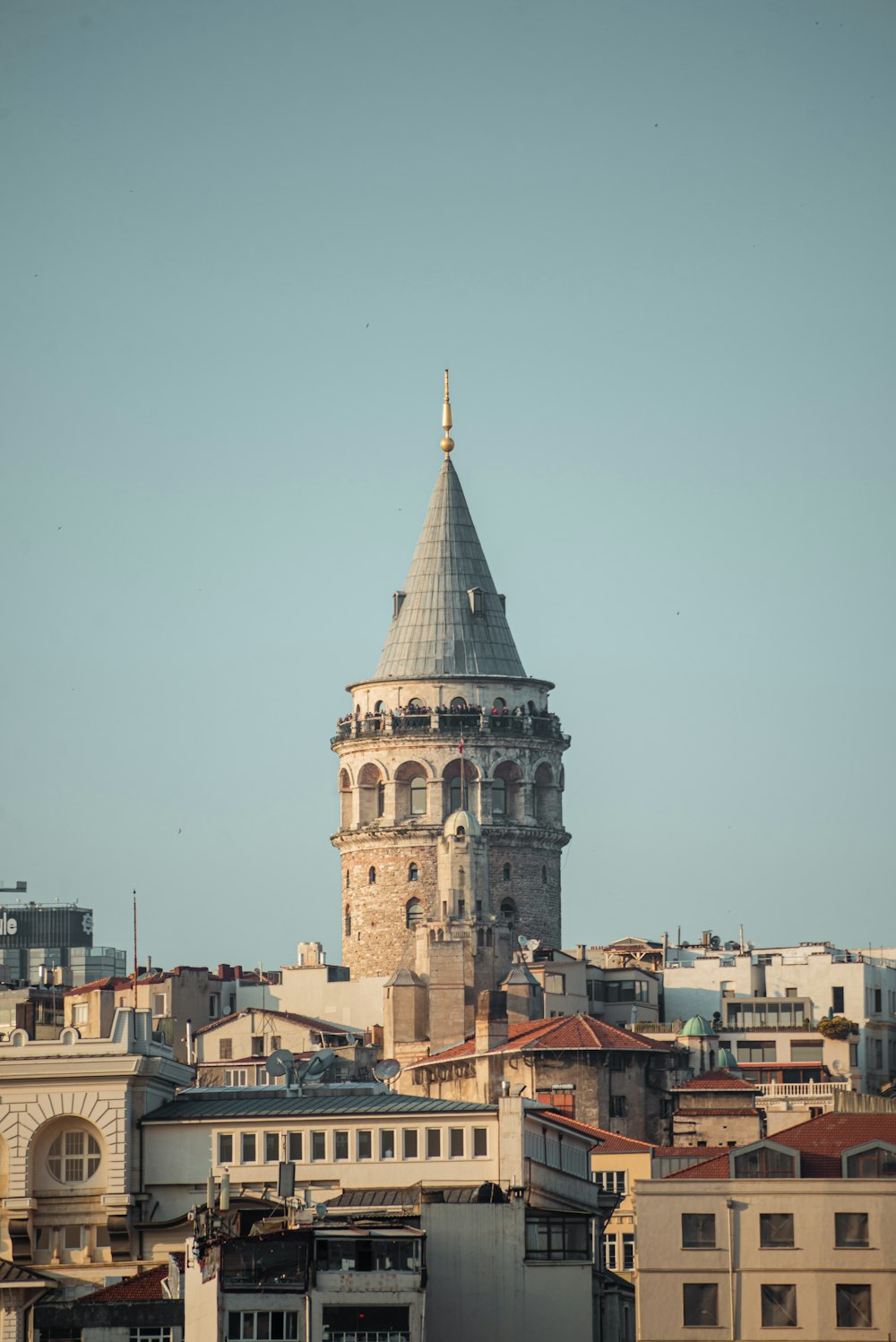 a tall tower with a clock on top of it