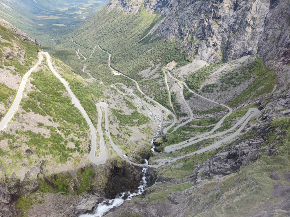 an aerial view of a winding mountain road