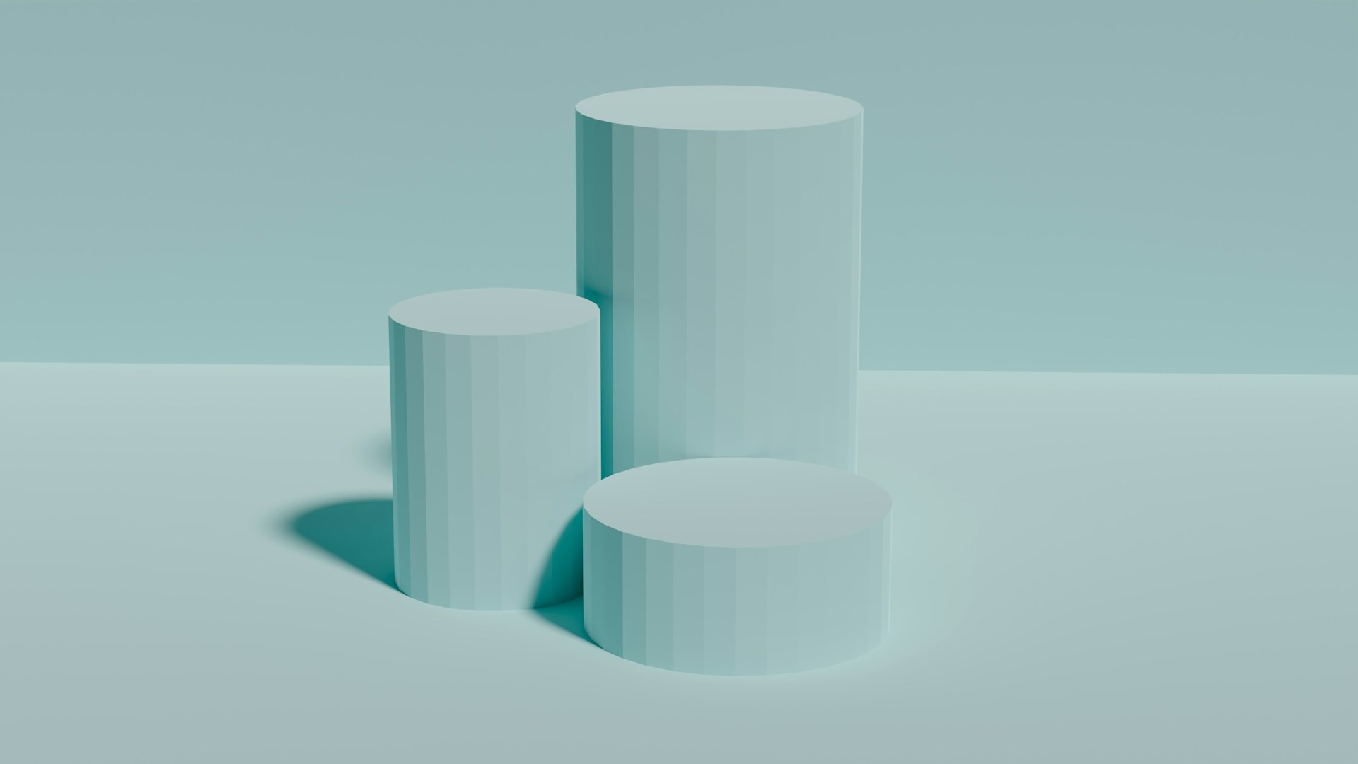 three white cylindrical objects on a light blue background