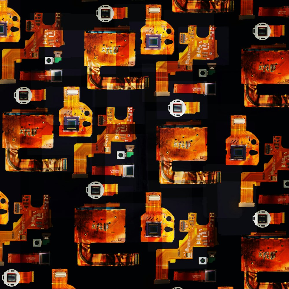 a black background with orange and yellow images