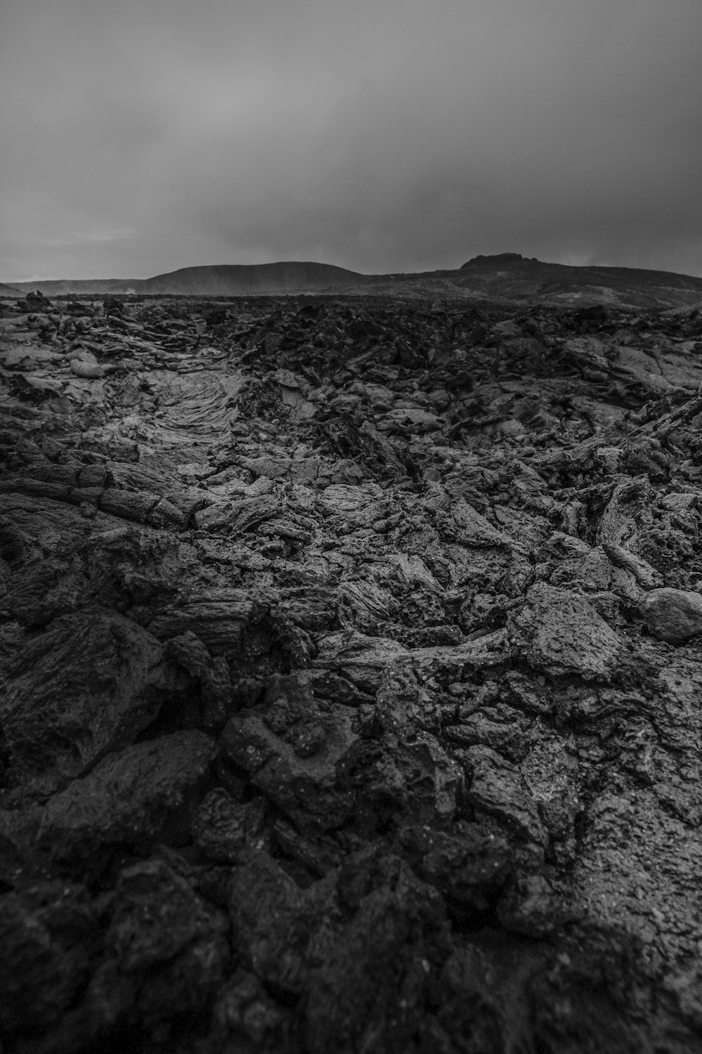 a black and white photo of a rocky landscape