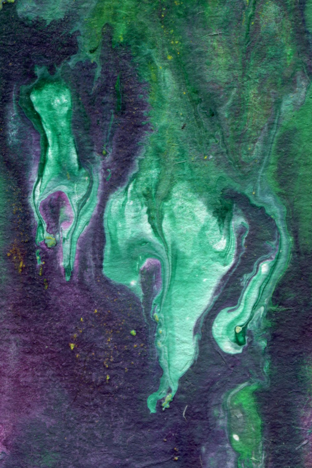 an abstract painting of green and purple colors