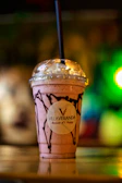 a close up of a drink on a table