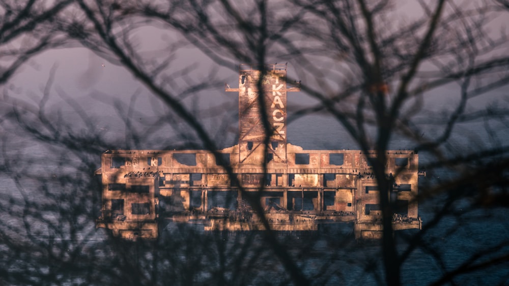 a large building sitting on top of a body of water