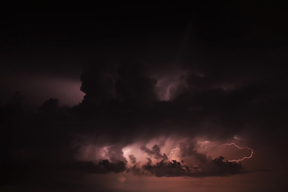 a large cloud filled with lots of lightning