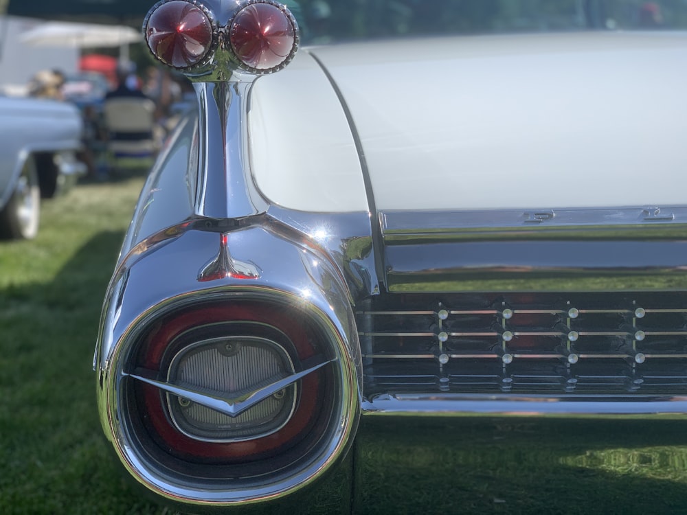 a close up of the tail end of a classic car
