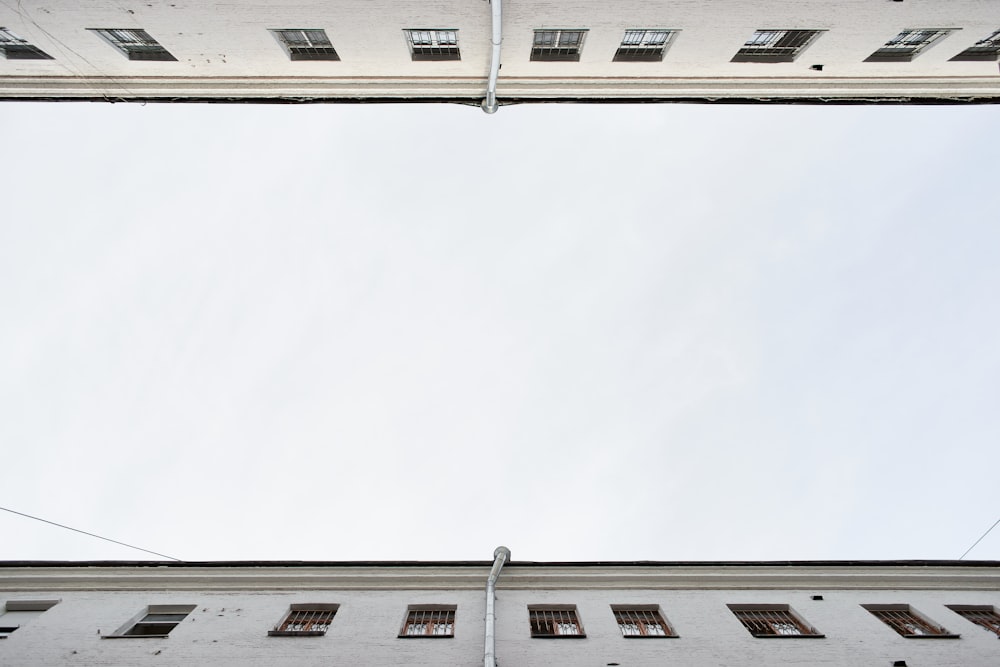 looking up at a tall building from below