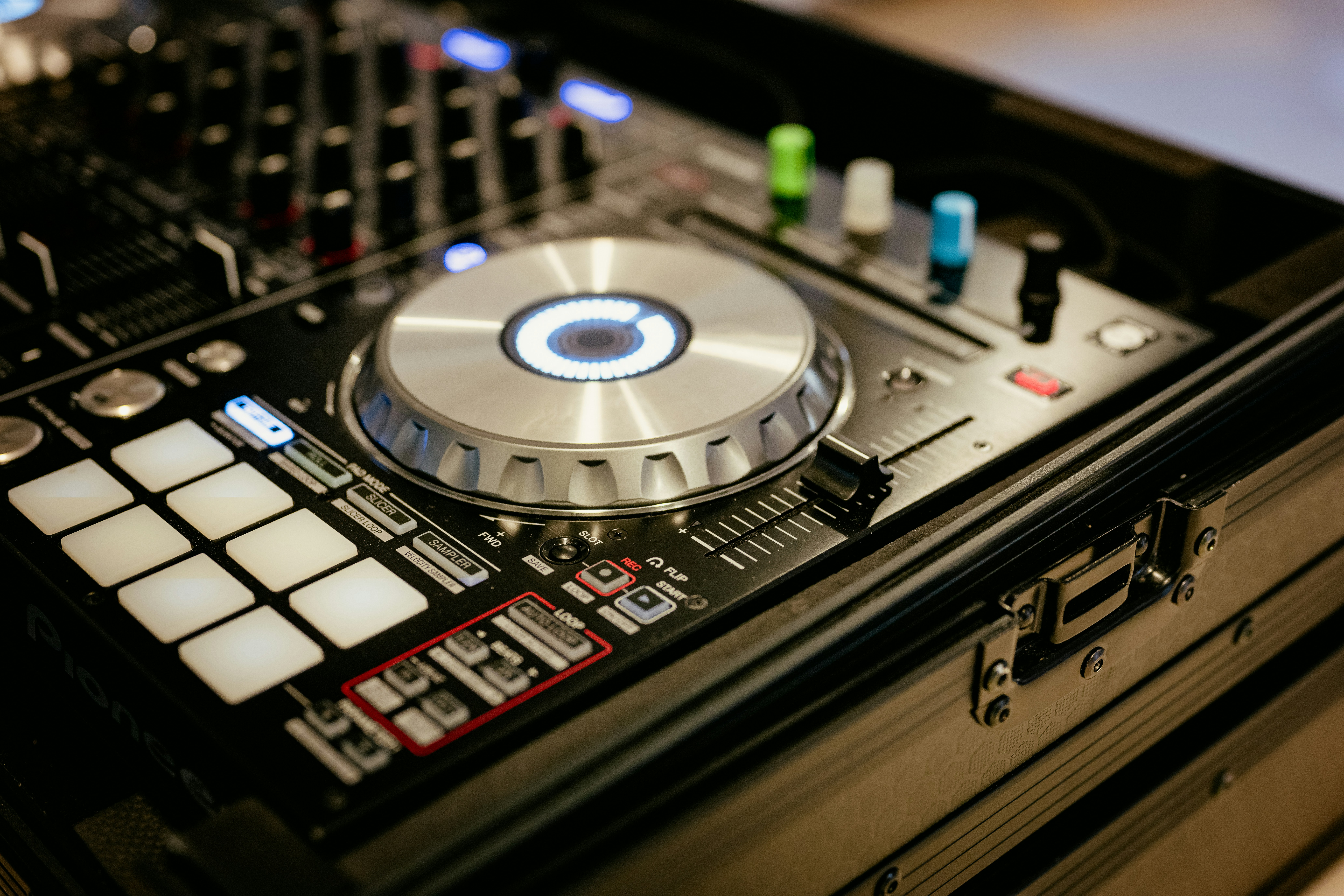 a close up of a dj controller on a table